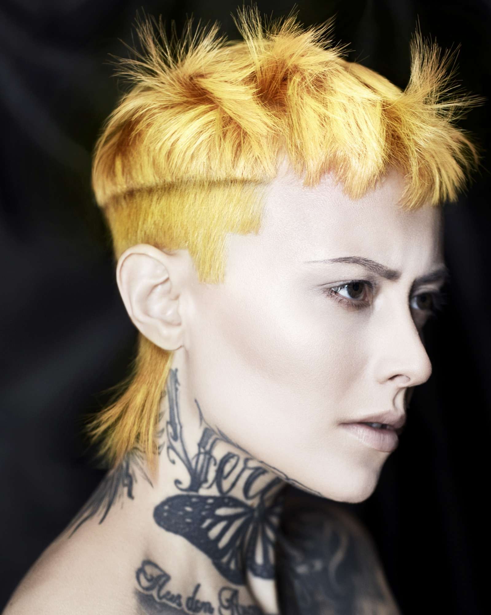 Jewel collection Jewel collection: cropped yellow-blonde hair against black