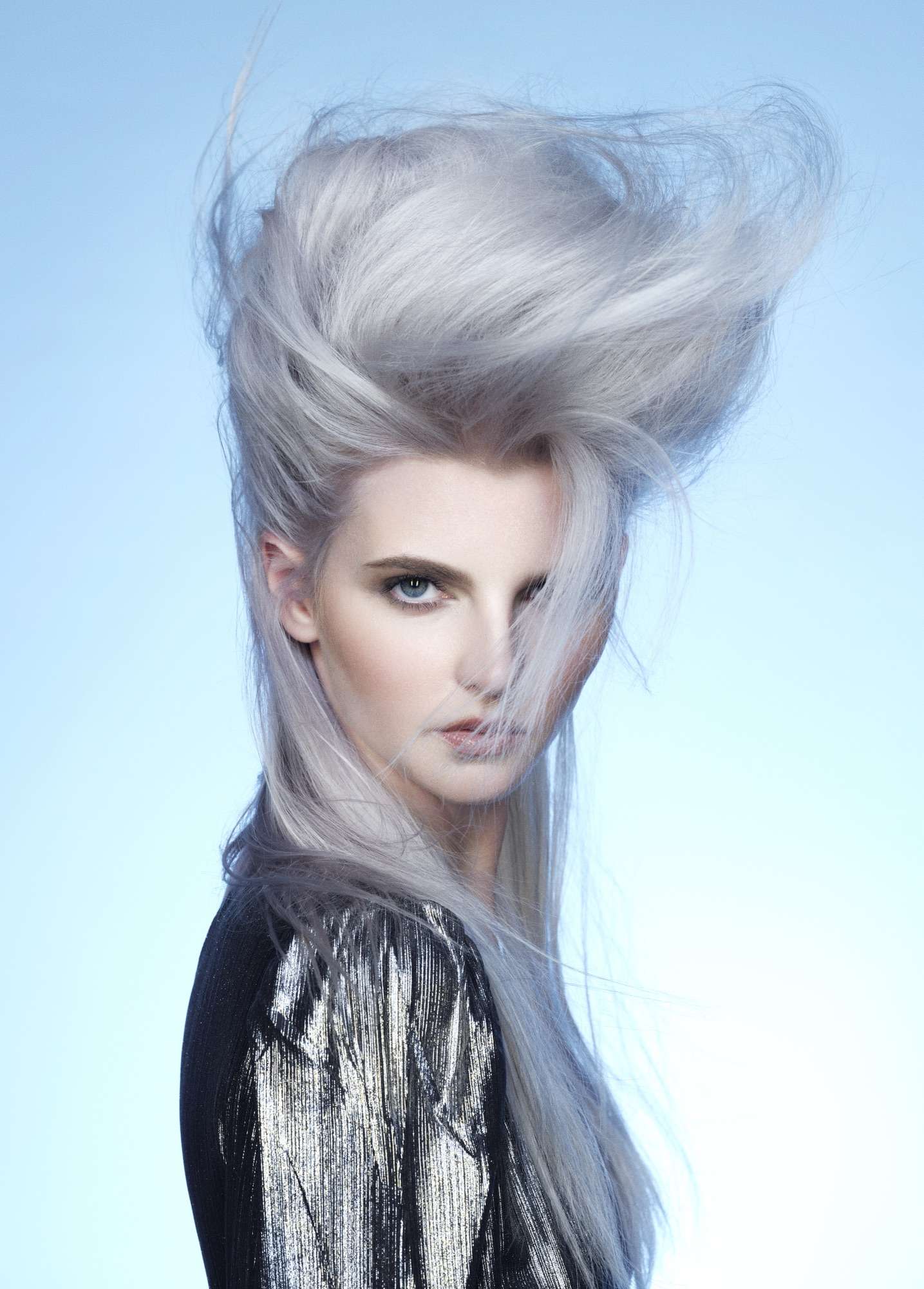 Forever Colour collection by Ashley Gamble NXT Forever Colour collection: silver hair sculpted upwards against pale blue