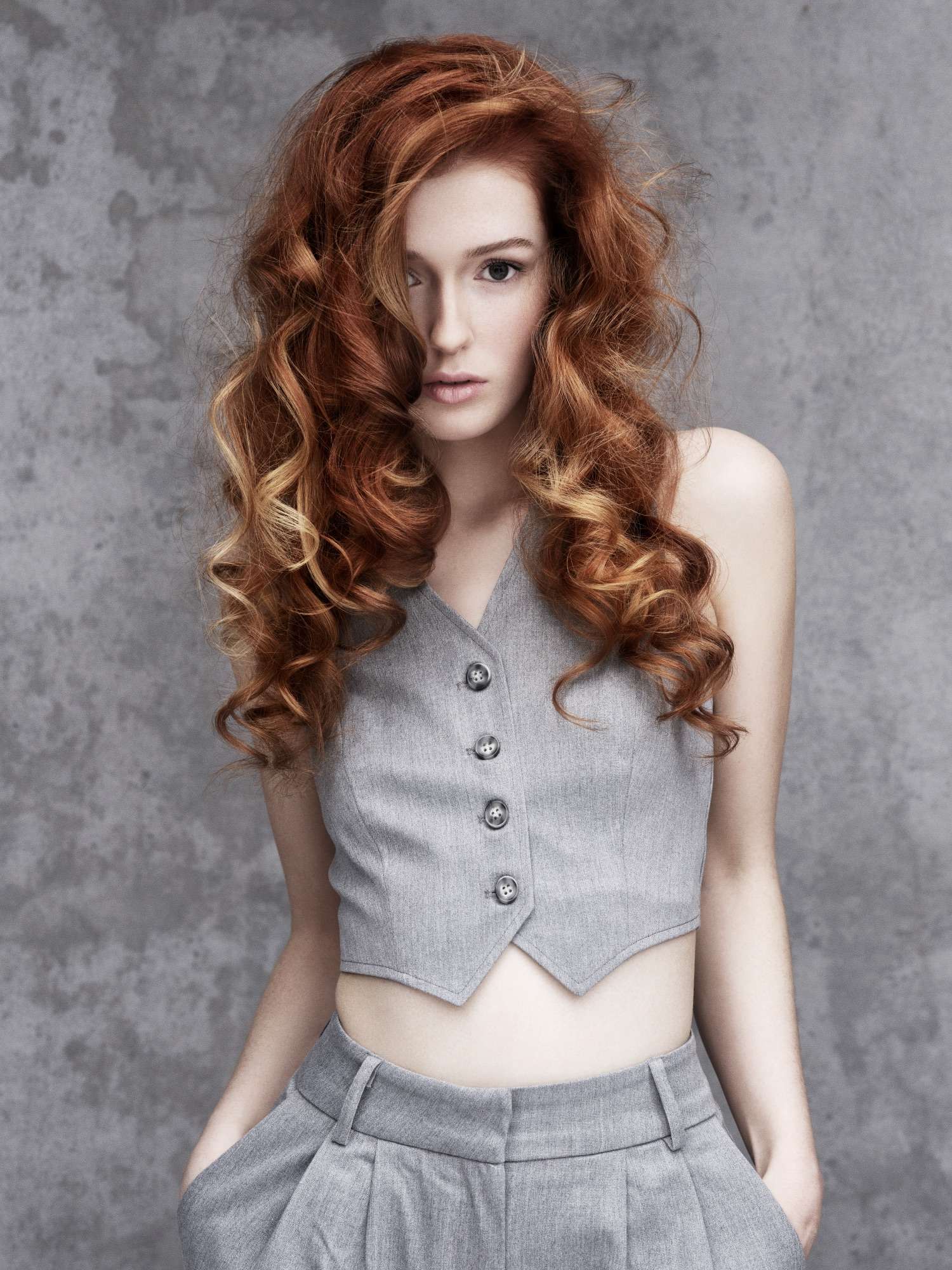Stone collection Stone collection: long copper curls against grey